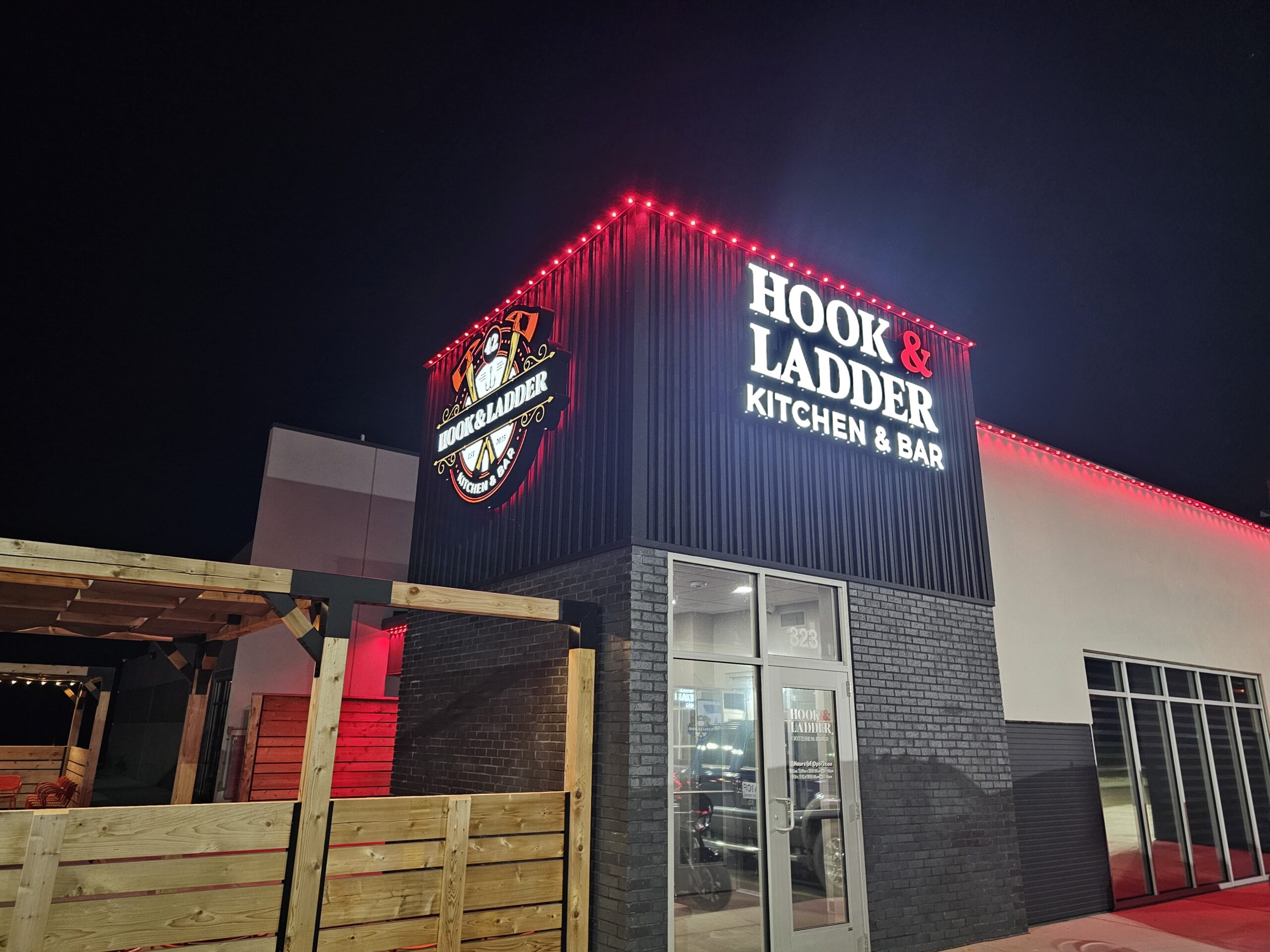Hook and Ladder location with custom red Gemstone Lights on roof